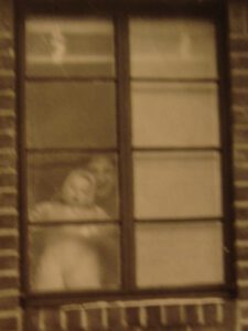 A blurry photo of Jimmy being held by his mother Rebecca. The only photo he has of his mother.